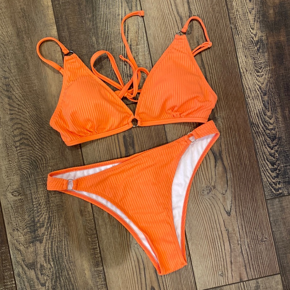 Orange ring swimsuit size medium brand new without tags